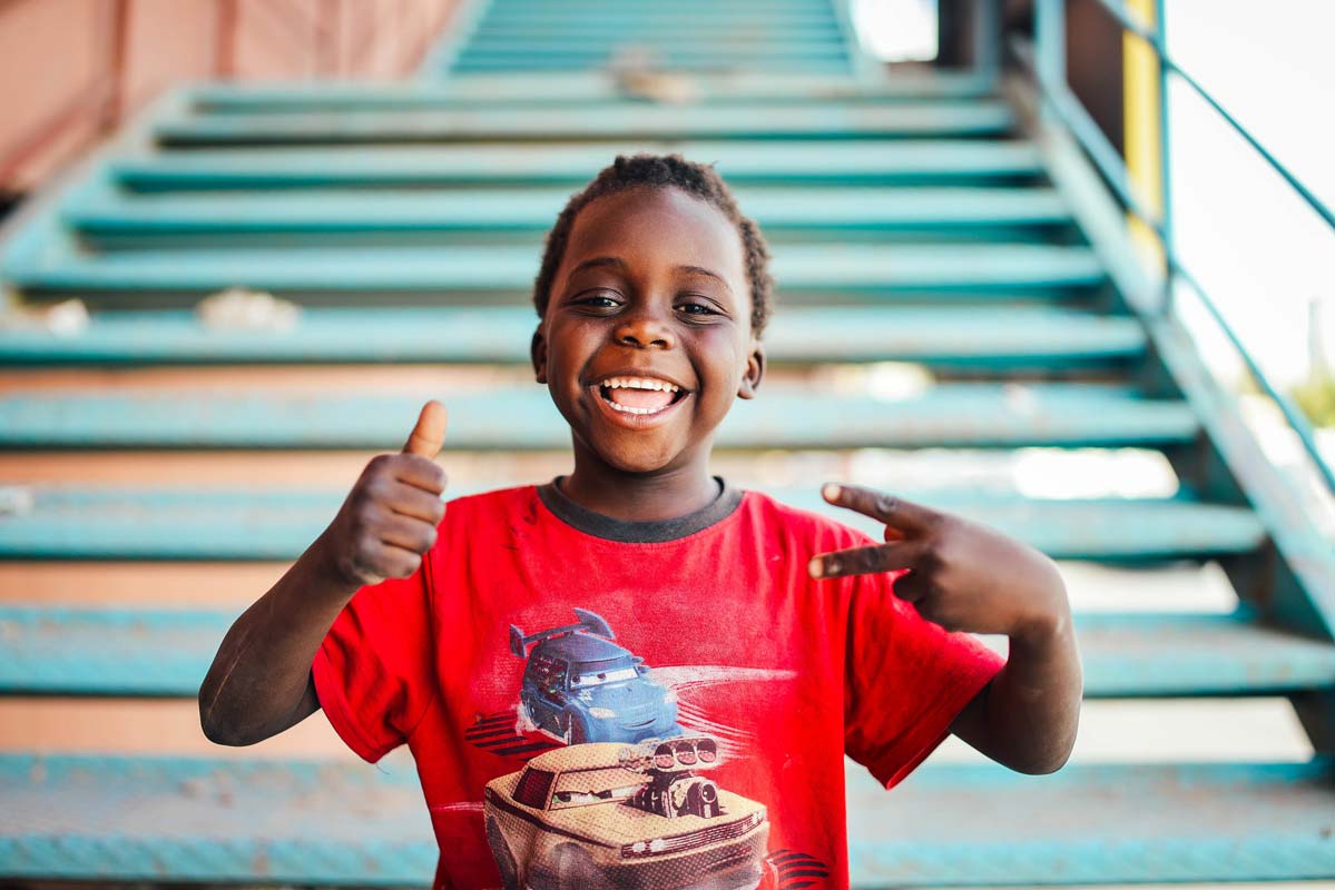 young boy on stairs